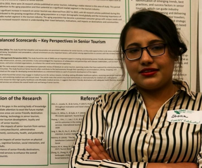 Sudeshana Paramita Ghose posing with research